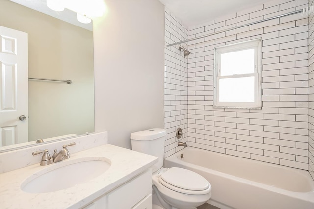 full bath with vanity, toilet, and bathing tub / shower combination