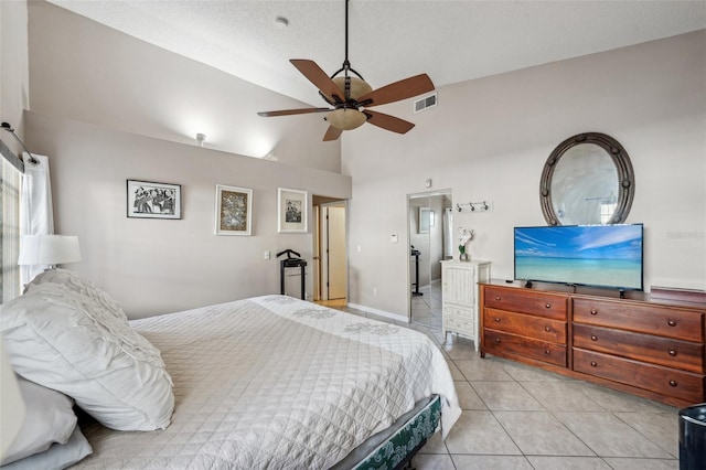 bedroom with high vaulted ceiling, visible vents, ceiling fan, and light tile patterned flooring