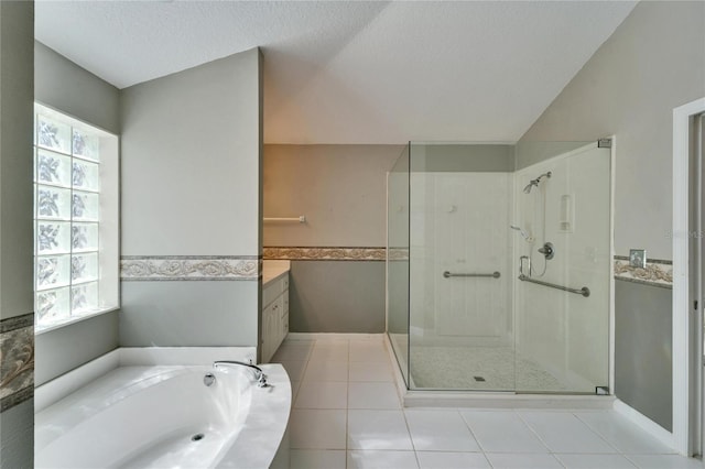 full bathroom with a stall shower, plenty of natural light, a garden tub, and tile patterned floors