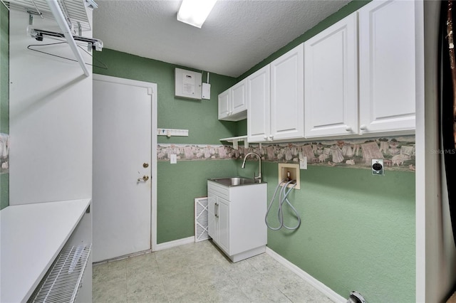 laundry room featuring cabinet space, visible vents, a sink, hookup for a washing machine, and electric dryer hookup