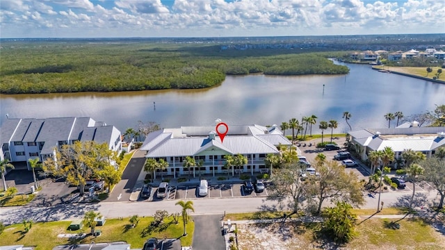 bird's eye view with a water view