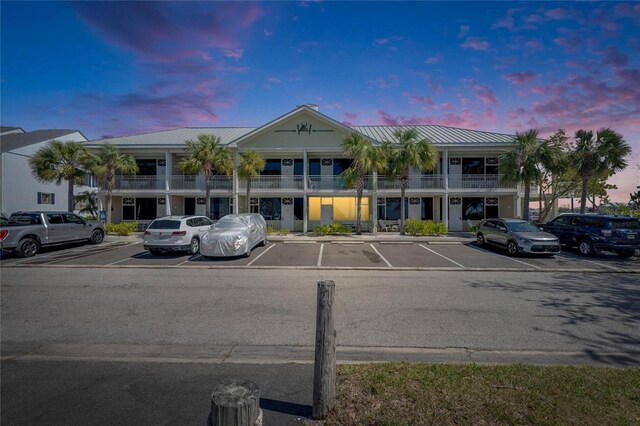 611 Destiny Dr Unit 304, Ruskin, FL 33570 - view of building exterior featuring uncovered parking