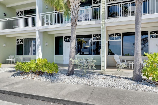 611 Destiny Dr Unit 304, Ruskin, FL 33570 - entrance to property with stucco siding
