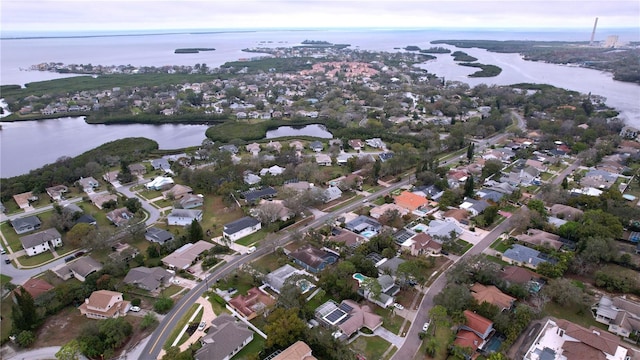 birds eye view of property with a residential view and a water view