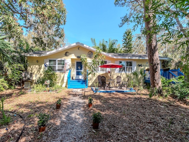 view of front of home featuring a patio