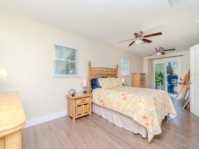 bedroom featuring access to outside, light wood-type flooring, a ceiling fan, and baseboards