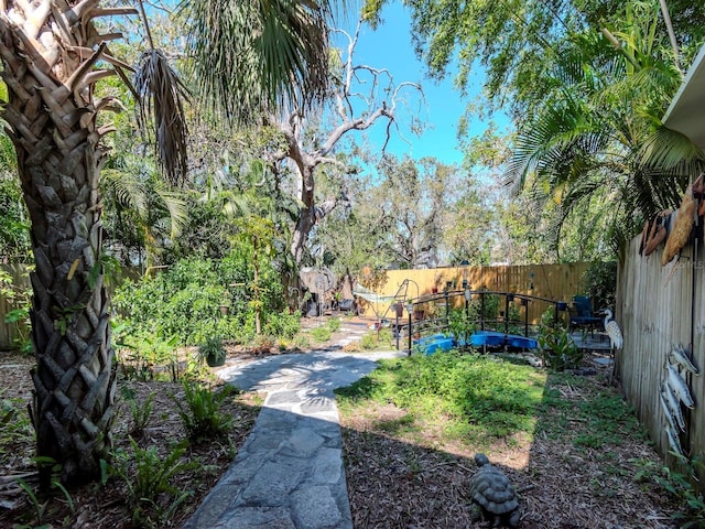 view of yard featuring a fenced backyard