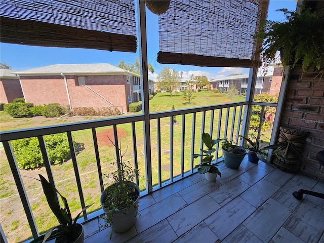 balcony featuring a residential view