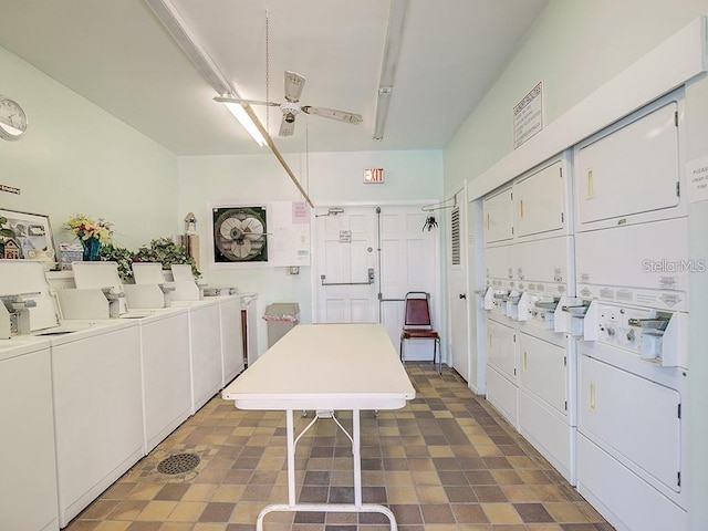 common laundry area featuring separate washer and dryer and stacked washer and clothes dryer