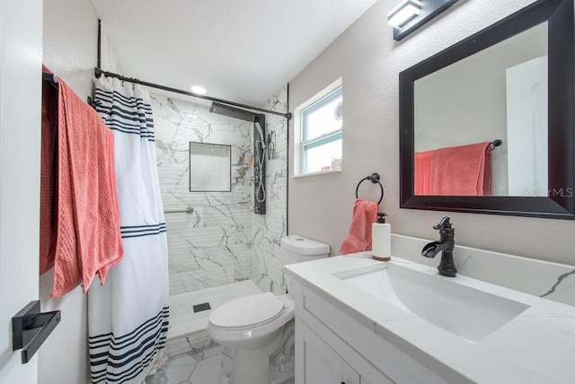 bathroom featuring marble finish floor, vanity, a shower stall, and toilet