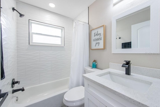 full bathroom with toilet, shower / bath combo with shower curtain, and vanity