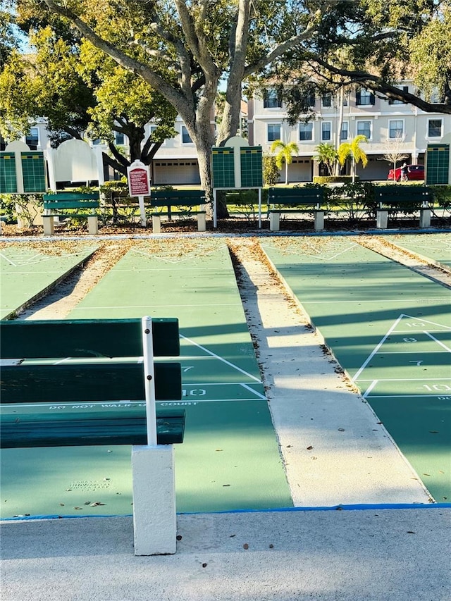 view of community featuring shuffleboard