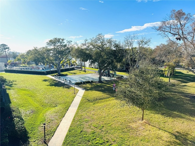 surrounding community featuring a yard