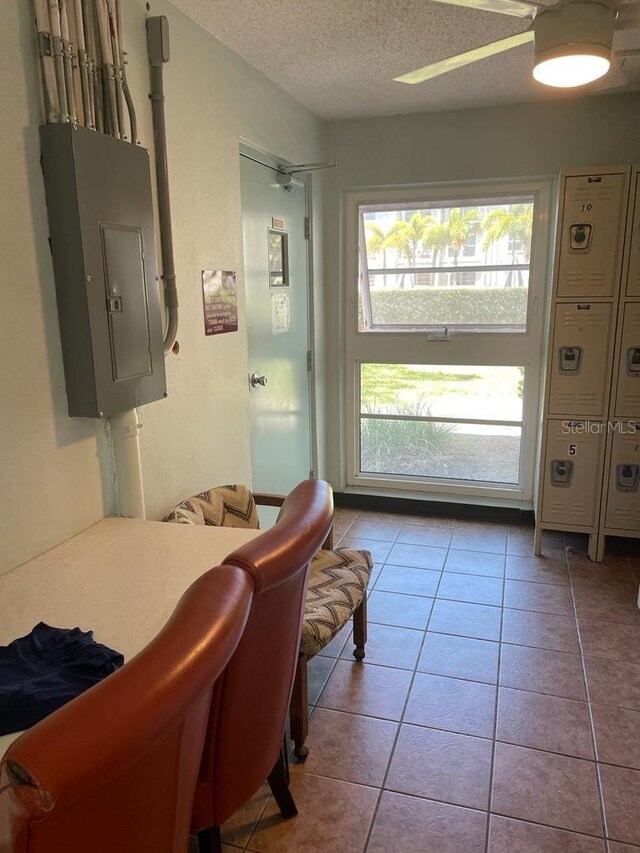 2700 Bayshore Blvd Unit 2308, Dunedin, FL 34698 - entryway featuring electric panel, a textured ceiling, ceiling fan, and tile patterned floors