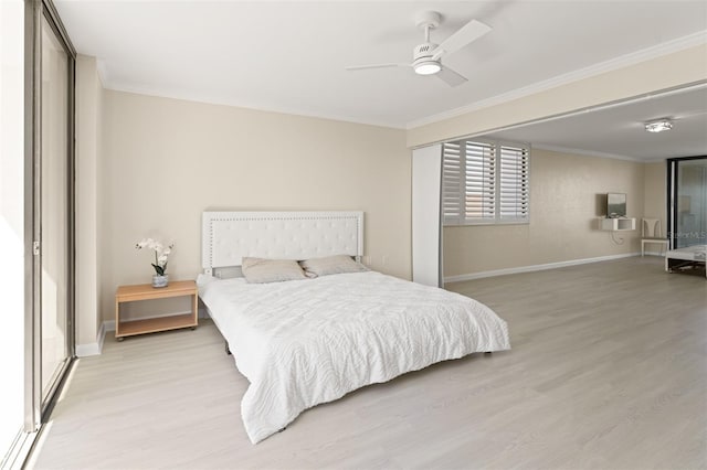 bedroom featuring ornamental molding, ceiling fan, light wood-style flooring, and baseboards