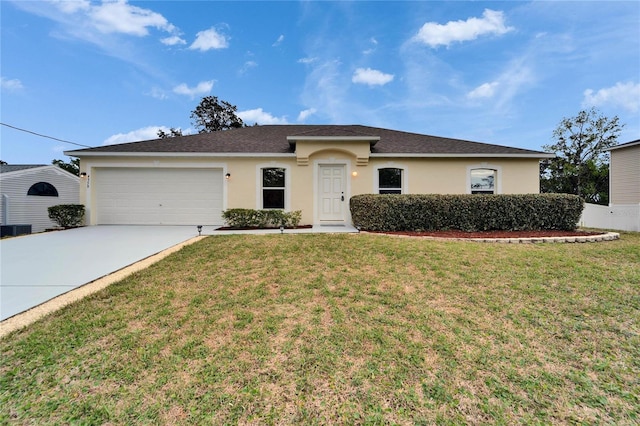 ranch-style house with a garage, concrete driveway, a front lawn, and stucco siding