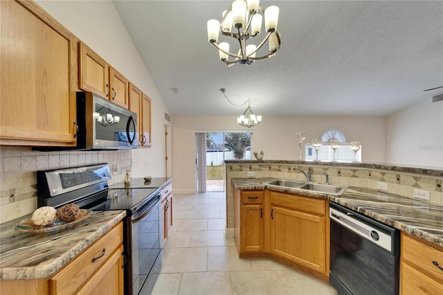 kitchen featuring black dishwasher, stainless steel microwave, a chandelier, a sink, and range with electric stovetop