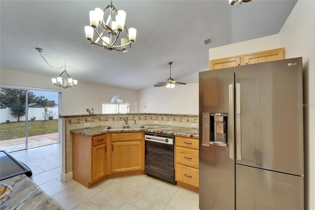 kitchen featuring stainless steel fridge, dishwasher, decorative light fixtures, a peninsula, and a sink