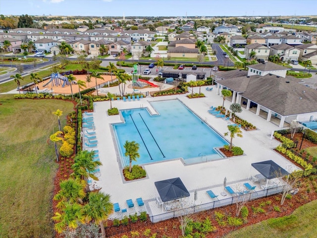 community pool featuring a residential view