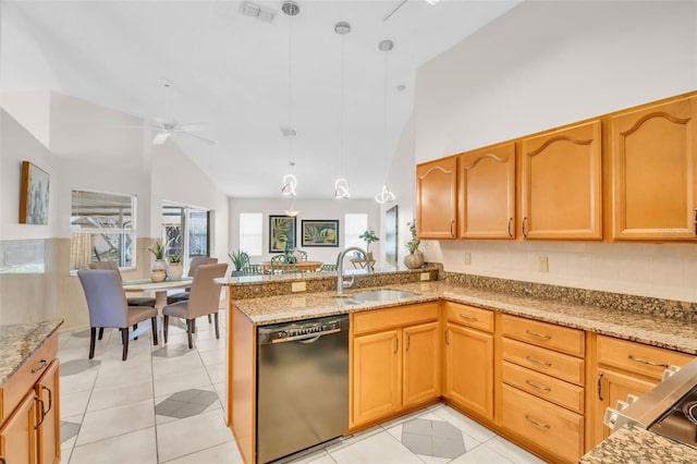 kitchen with light stone counters, light tile patterned flooring, a sink, black dishwasher, and pendant lighting