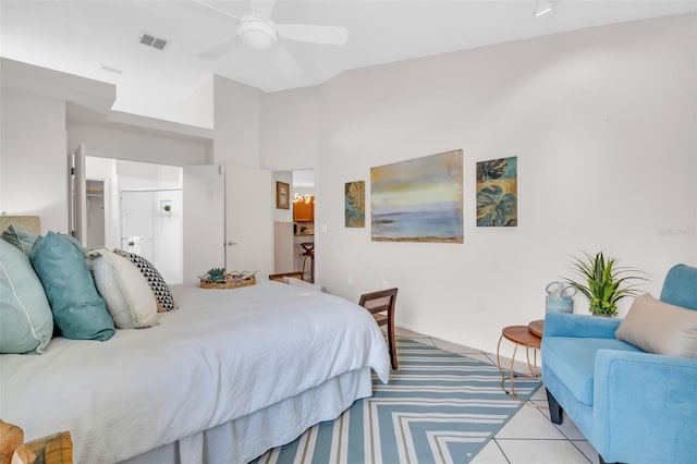 carpeted bedroom featuring a ceiling fan and visible vents