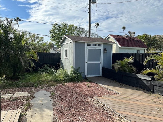 view of shed with a fenced backyard