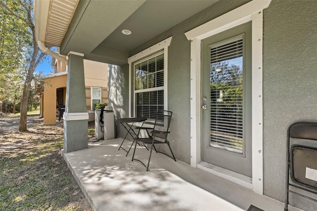 view of patio featuring a porch