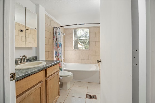 full bathroom featuring visible vents, toilet, shower / bath combo, vanity, and tile patterned flooring