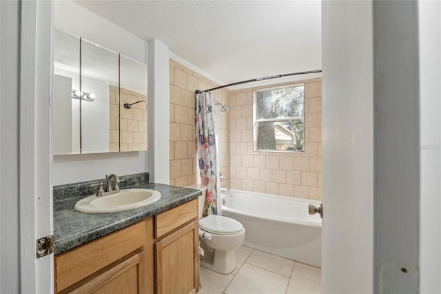 bathroom featuring a textured ceiling, tile patterned flooring, toilet, vanity, and shower / bathtub combination with curtain