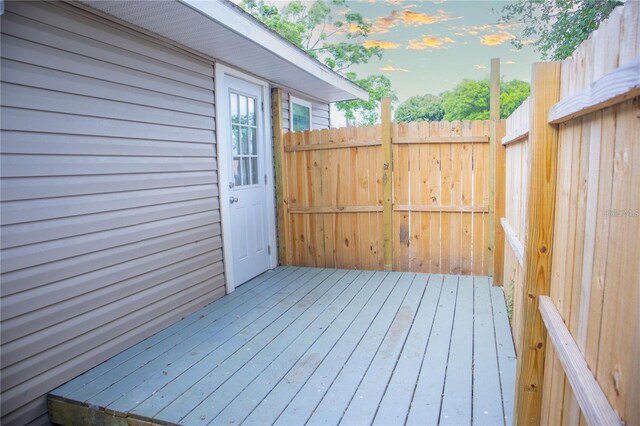 wooden deck featuring fence