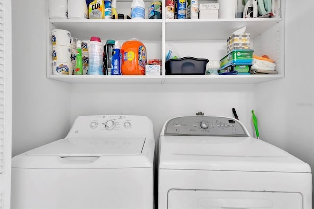 clothes washing area with laundry area and washing machine and dryer