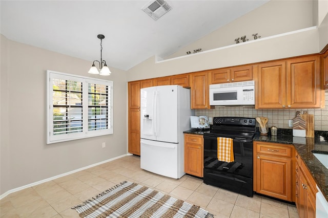 kitchen featuring white appliances, brown cabinetry, visible vents, and tasteful backsplash