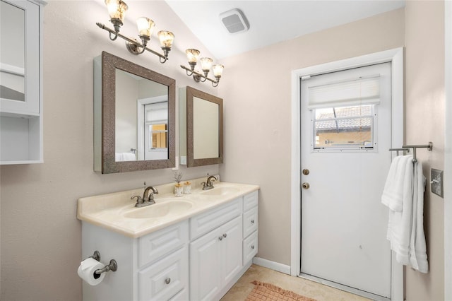 full bathroom with tile patterned flooring, visible vents, a sink, and double vanity