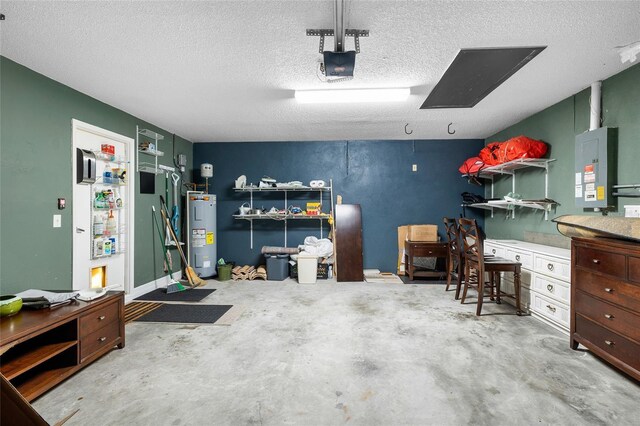 garage with a garage door opener and electric water heater