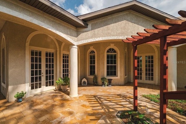 view of patio / terrace featuring french doors