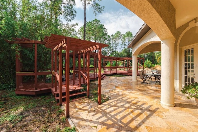 view of patio / terrace featuring a pergola and french doors