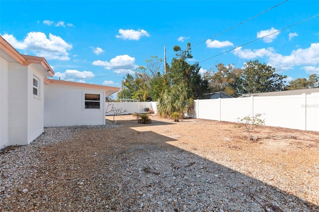 view of yard featuring a fenced backyard