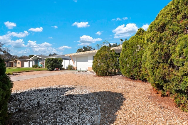 view of front of house with driveway and an attached garage