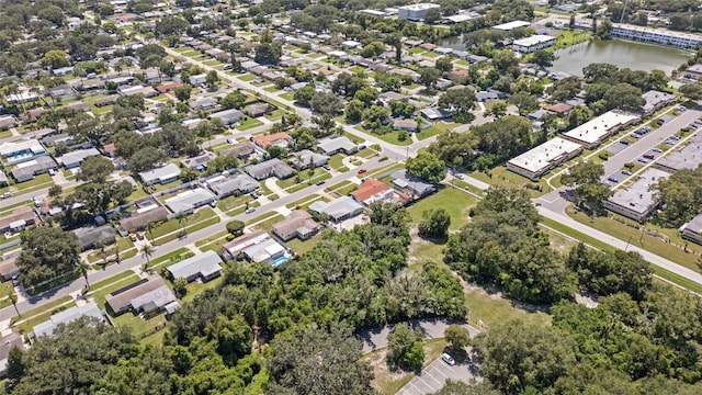 bird's eye view with a water view and a residential view