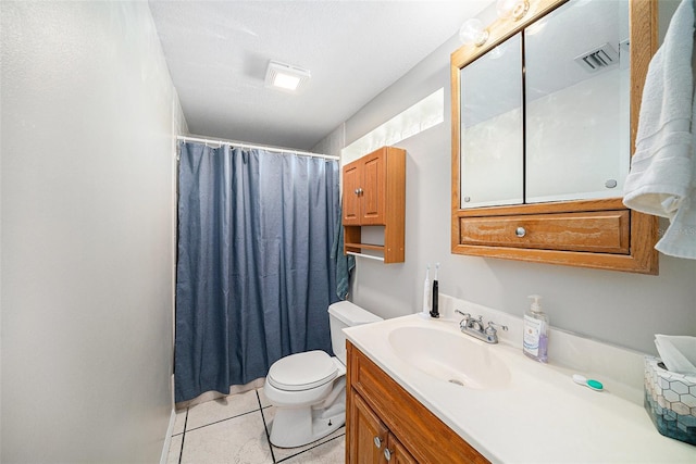 bathroom with visible vents, toilet, a shower with curtain, tile patterned floors, and vanity