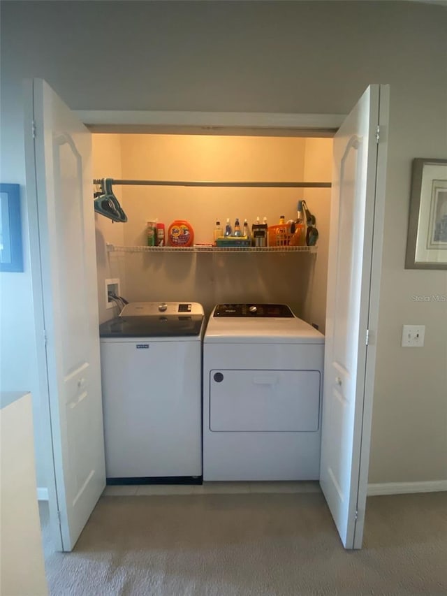 laundry area featuring laundry area and washer and dryer