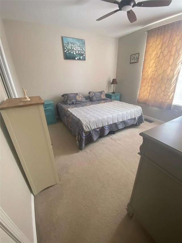 bedroom featuring carpet floors and ceiling fan