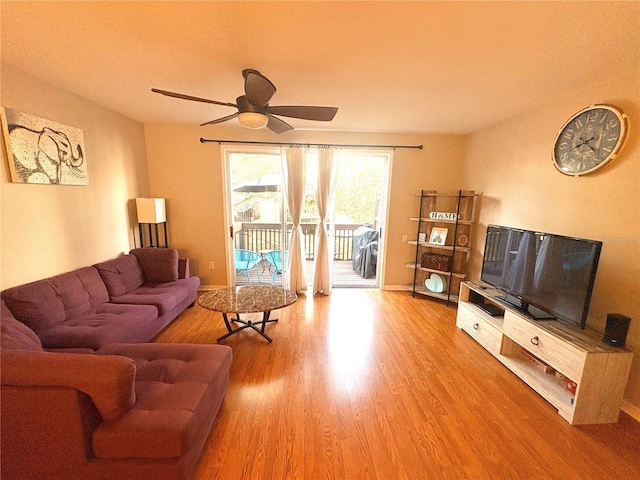 3128 Bayshore Oaks Dr, Tampa, FL 33611 - living room with wood finished floors and ceiling fan