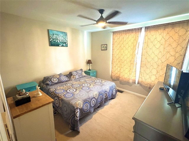 3128 Bayshore Oaks Dr, Tampa, FL 33611 - carpeted bedroom with ceiling fan