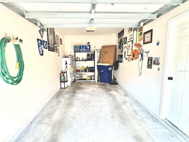 3128 Bayshore Oaks Dr, Tampa, FL 33611 - garage featuring water heater and a garage door opener
