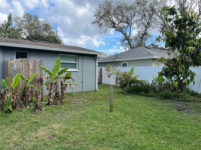 view of yard with fence