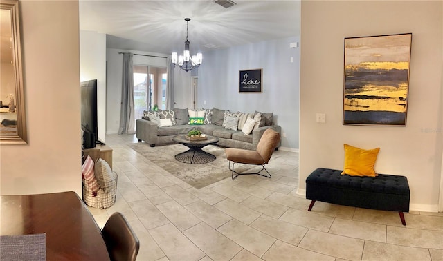 living room featuring a notable chandelier