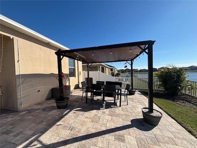 view of patio featuring outdoor dining space and a fenced backyard