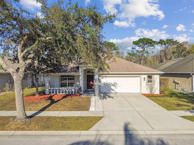 view of front of house with driveway, a garage, roof with shingles, covered porch, and stucco siding