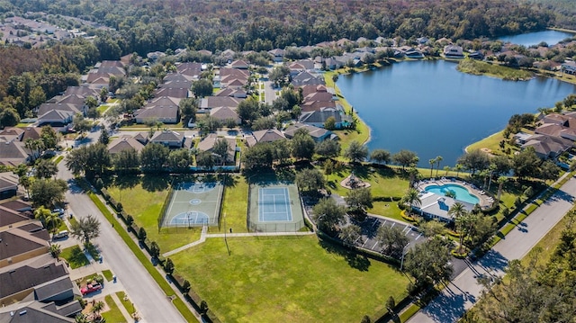 aerial view featuring a residential view and a water view